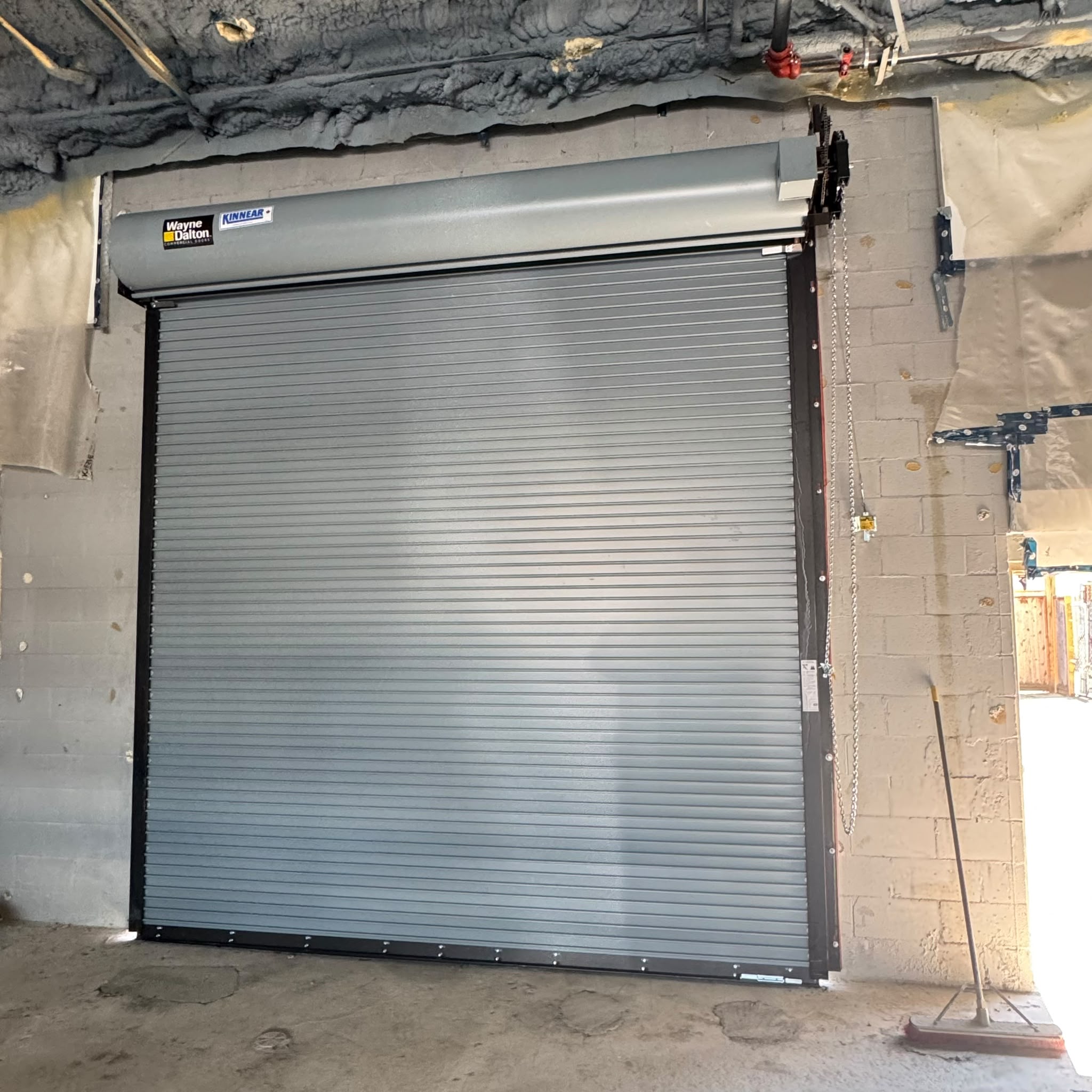 Insulated commercial roll-up door — finished install