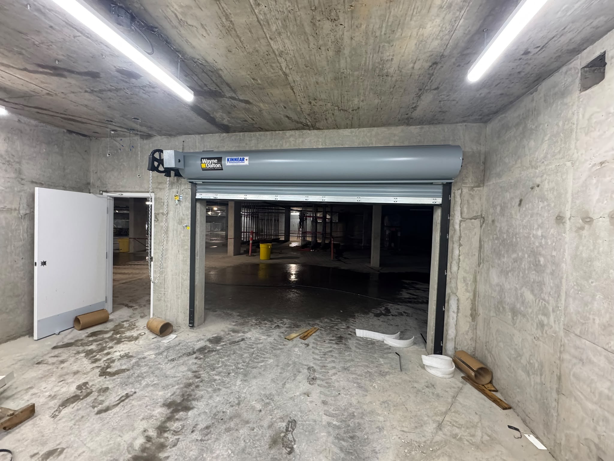 Rolling door for an underground parkade entrance